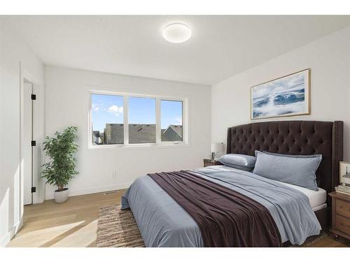 321 Baneberry Way Sw, Airdrie, AB - Indoor Photo Showing Bedroom