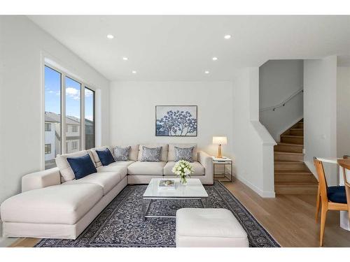 321 Baneberry Way Sw, Airdrie, AB - Indoor Photo Showing Living Room