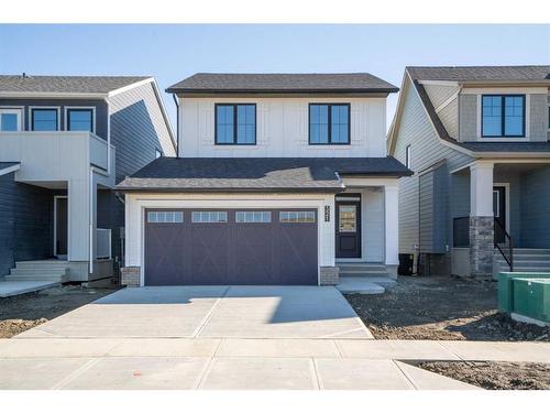 321 Baneberry Way Sw, Airdrie, AB - Outdoor With Facade