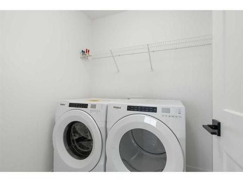 321 Baneberry Way Sw, Airdrie, AB - Indoor Photo Showing Laundry Room