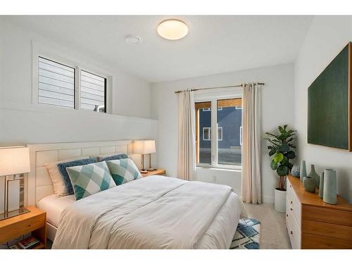 321 Baneberry Way Sw, Airdrie, AB - Indoor Photo Showing Bedroom