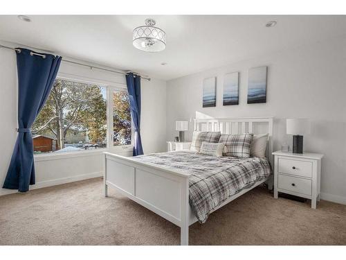 91 Midglen Way Se, Calgary, AB - Indoor Photo Showing Bedroom