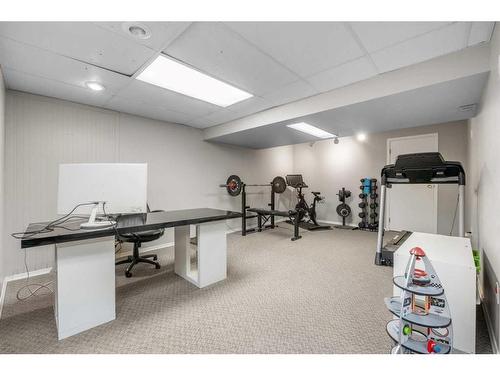 91 Midglen Way Se, Calgary, AB - Indoor Photo Showing Gym Room