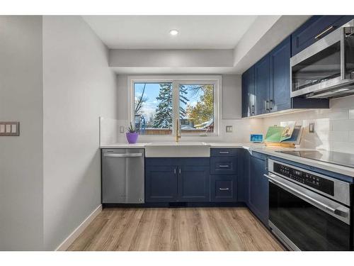 91 Midglen Way Se, Calgary, AB - Indoor Photo Showing Kitchen