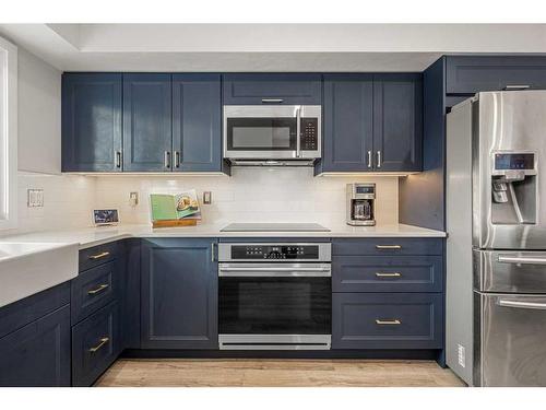 91 Midglen Way Se, Calgary, AB - Indoor Photo Showing Kitchen With Upgraded Kitchen