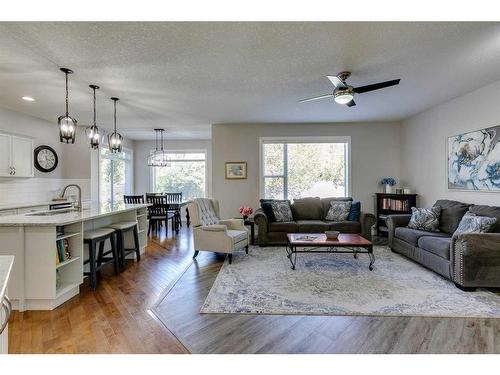 530 Tuscany Ravine Road Nw, Calgary, AB - Indoor Photo Showing Living Room