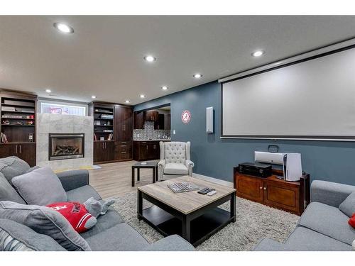 530 Tuscany Ravine Road Nw, Calgary, AB - Indoor Photo Showing Living Room With Fireplace