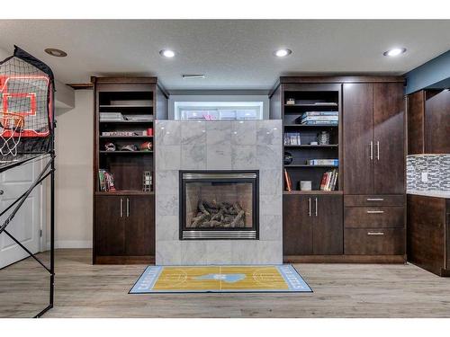 530 Tuscany Ravine Road Nw, Calgary, AB - Indoor With Fireplace