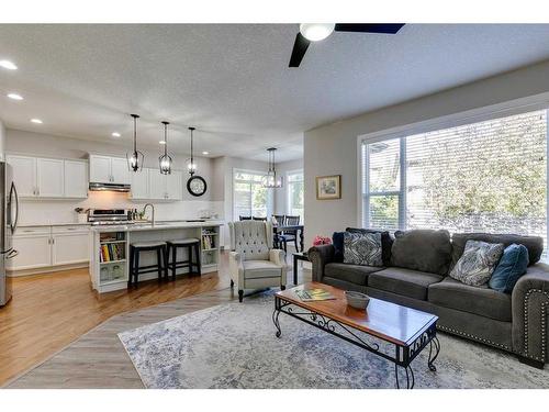 530 Tuscany Ravine Road Nw, Calgary, AB - Indoor Photo Showing Living Room