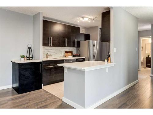 707-111 14 Avenue Se, Calgary, AB - Indoor Photo Showing Kitchen With Upgraded Kitchen