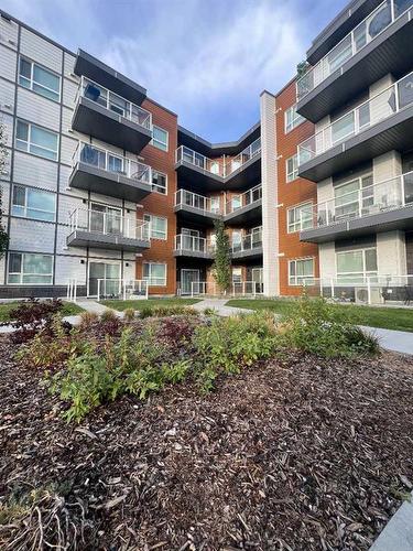 320-360 Harvest Hills Way Ne, Calgary, AB - Outdoor With Balcony With Facade