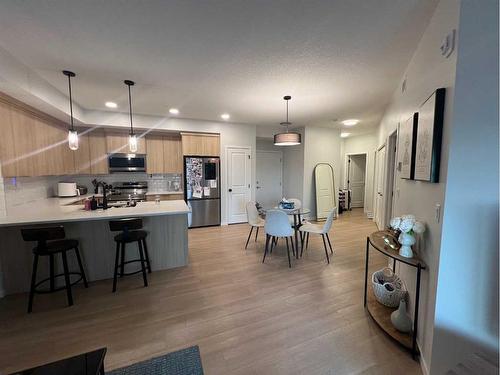 320-360 Harvest Hills Way Ne, Calgary, AB - Indoor Photo Showing Kitchen With Upgraded Kitchen