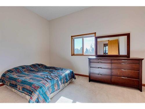 15 Taylor Bay, Rural Rocky View County, AB - Indoor Photo Showing Bedroom