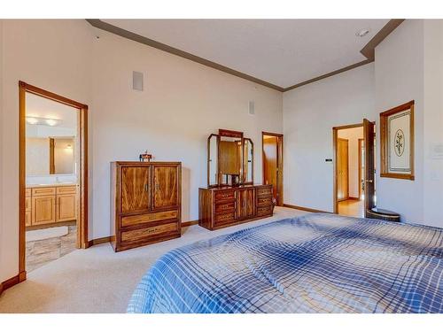 15 Taylor Bay, Rural Rocky View County, AB - Indoor Photo Showing Bedroom