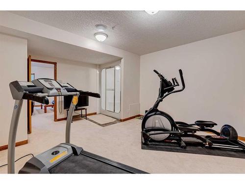 15 Taylor Bay, Rural Rocky View County, AB - Indoor Photo Showing Gym Room