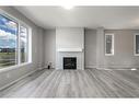 181 Carrington Crescent Nw, Calgary, AB  - Indoor Photo Showing Living Room With Fireplace 