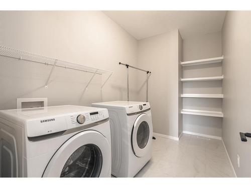 181 Carrington Crescent Nw, Calgary, AB - Indoor Photo Showing Laundry Room