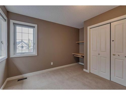 3 Evergreen Square Sw, Calgary, AB - Indoor Photo Showing Other Room