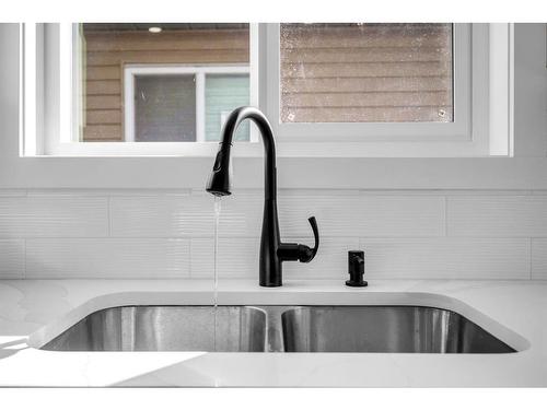 36 Falmere Way Ne, Calgary, AB - Indoor Photo Showing Kitchen With Double Sink