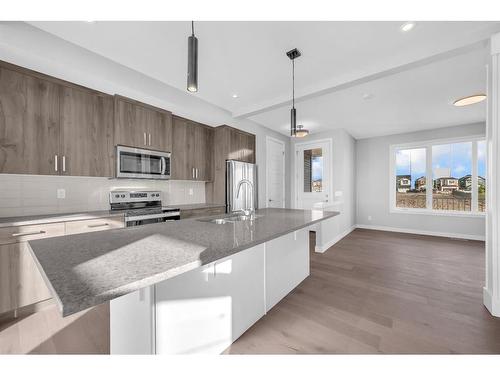 411 Sora Boulevard Se, Calgary, AB - Indoor Photo Showing Kitchen With Upgraded Kitchen