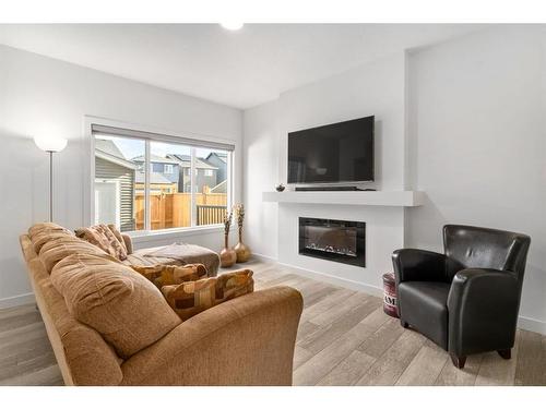 68 Legacy Glen Place Se, Calgary, AB - Indoor Photo Showing Living Room With Fireplace