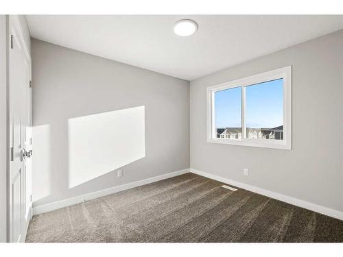 230 Marmot Walk Nw, Calgary, AB - Indoor Photo Showing Other Room