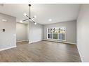 230 Marmot Walk Nw, Calgary, AB  - Indoor Photo Showing Living Room 