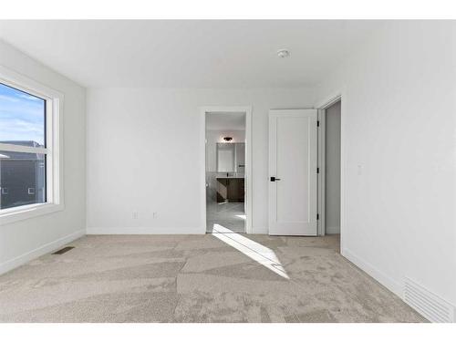 203 Kinniburgh Loop, Chestermere, AB - Indoor Photo Showing Other Room