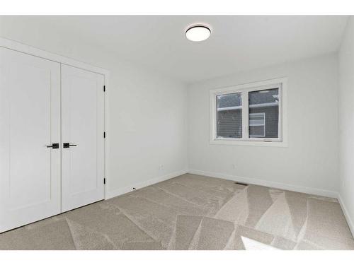 203 Kinniburgh Loop, Chestermere, AB - Indoor Photo Showing Basement