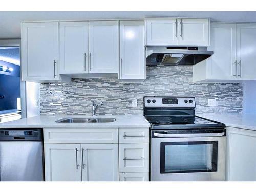 201-1820 9 Street Sw, Calgary, AB - Indoor Photo Showing Kitchen With Stainless Steel Kitchen With Double Sink With Upgraded Kitchen