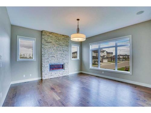 94 Panton View Nw, Calgary, AB - Indoor Photo Showing Living Room With Fireplace