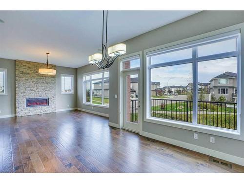 94 Panton View Nw, Calgary, AB - Indoor Photo Showing Living Room With Fireplace