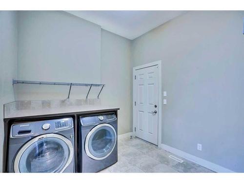 94 Panton View Nw, Calgary, AB - Indoor Photo Showing Laundry Room