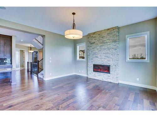 94 Panton View Nw, Calgary, AB - Indoor Photo Showing Living Room With Fireplace