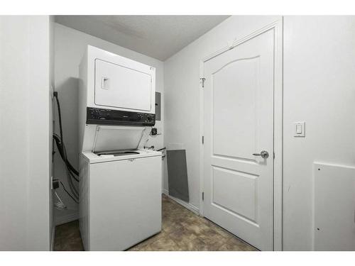 1310-303 Arbour Crest Drive Nw, Calgary, AB - Indoor Photo Showing Laundry Room