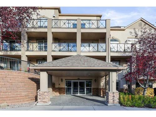 1310-303 Arbour Crest Drive Nw, Calgary, AB - Outdoor With Balcony With Facade