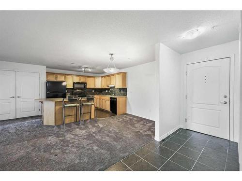 1310-303 Arbour Crest Drive Nw, Calgary, AB - Indoor Photo Showing Kitchen