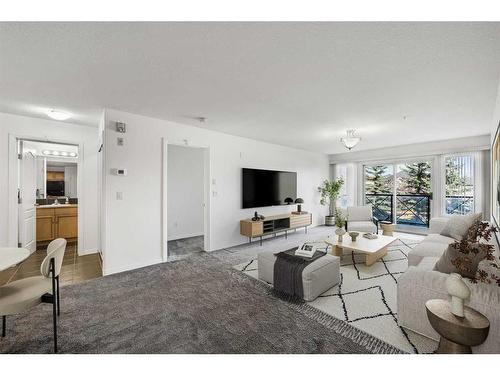 1310-303 Arbour Crest Drive Nw, Calgary, AB - Indoor Photo Showing Living Room