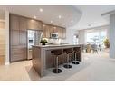 313-145 Burma Star Road Sw, Calgary, AB  - Indoor Photo Showing Kitchen With Stainless Steel Kitchen With Upgraded Kitchen 