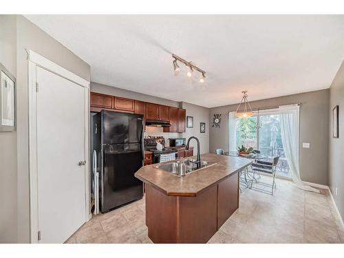 433 Tuscany Drive Nw, Calgary, AB - Indoor Photo Showing Kitchen With Double Sink