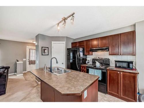 433 Tuscany Drive Nw, Calgary, AB - Indoor Photo Showing Kitchen With Double Sink