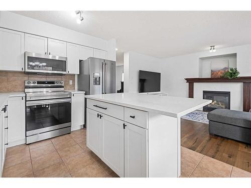 8 Bridleridge Lane Sw, Calgary, AB - Indoor Photo Showing Kitchen With Stainless Steel Kitchen