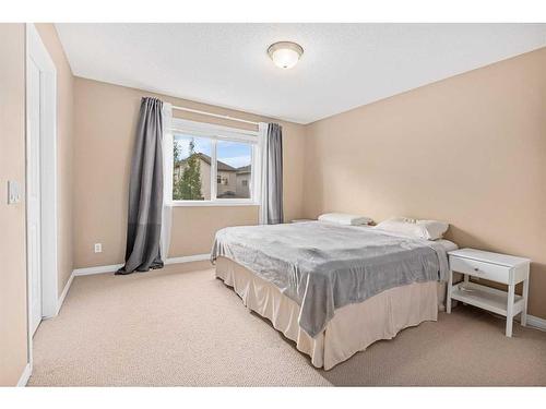 8 Bridleridge Lane Sw, Calgary, AB - Indoor Photo Showing Bedroom