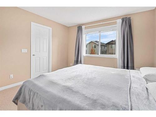 8 Bridleridge Lane Sw, Calgary, AB - Indoor Photo Showing Bedroom