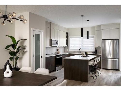 35 Legacy Reach Court Se, Calgary, AB - Indoor Photo Showing Kitchen With Stainless Steel Kitchen With Upgraded Kitchen