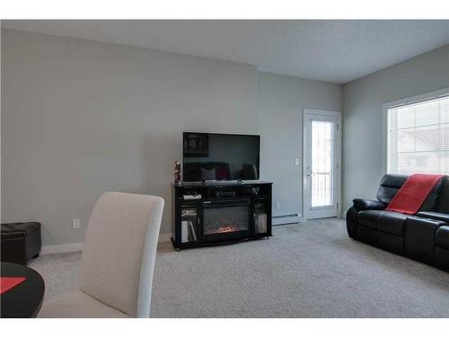 322-20 Royal Oak Plaza Nw, Calgary, AB - Indoor Photo Showing Living Room