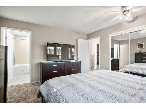 60 Riverbirch Court Se, Calgary, AB - Indoor Photo Showing Bedroom