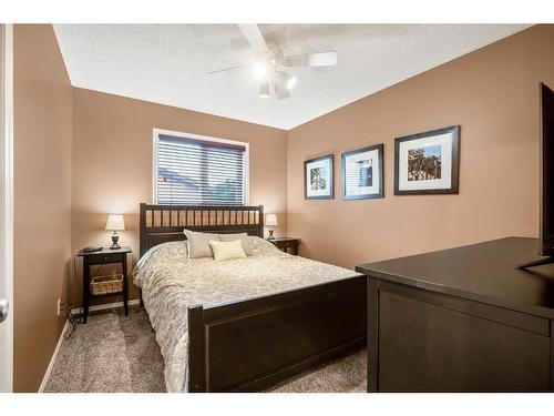 60 Riverbirch Court Se, Calgary, AB - Indoor Photo Showing Bedroom