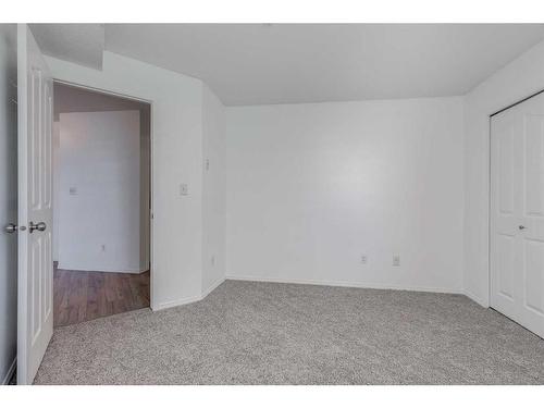 119-7210 80 Avenue Ne, Calgary, AB - Indoor Photo Showing Other Room