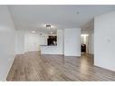 119-7210 80 Avenue Ne, Calgary, AB  - Indoor Photo Showing Living Room 